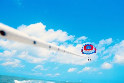 Low angle view of airshow against blue sky