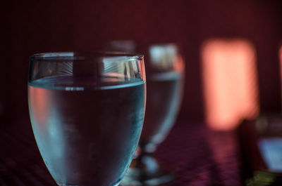 Close-up of beer glass on table