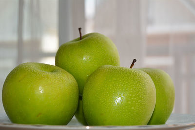 Close-up of apples on table