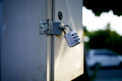 Close-up of padlock on closed door