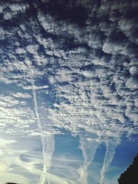 Aerial view of vapor trail in sky