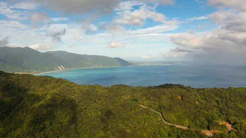 Top view of mountains with tropical forest and blue ocean. tropical landscape. philippines.