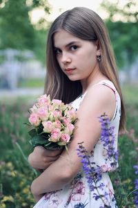 Girl holding flower bouquet