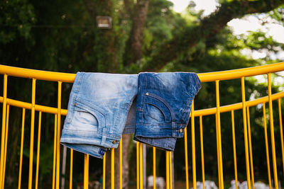 Close-up of playground against trees