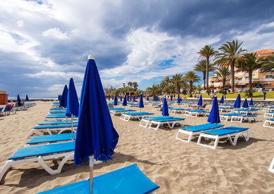 Panoramic view of beach against blue sky