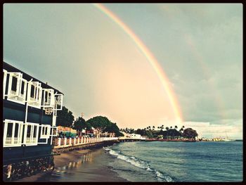 Rainbow over calm sea