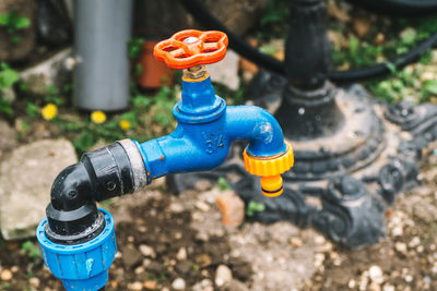 Close-up side view of a tap