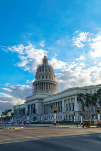 Buildings in city against sky