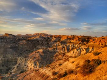 Scenic view of landscape against sky during sunset