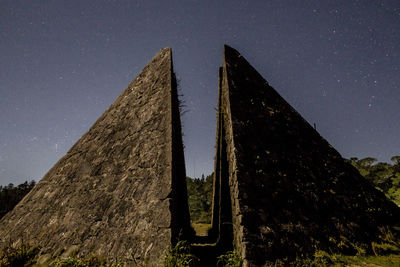 Low angle view of castle against mountain