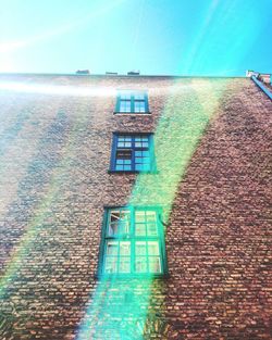 Low angle view of building against clear blue sky