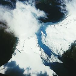 Scenic view of tree mountains against sky