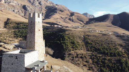 High angle view of townscape against mountain