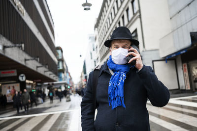 Man wearing protective mask on street
