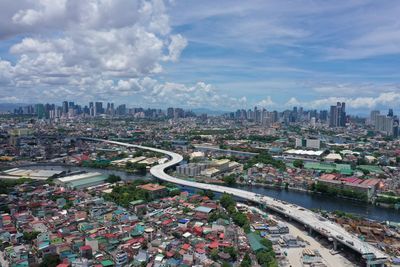 High angle view of street amidst buildings in city