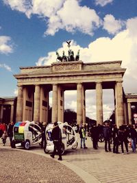 Tourists in front of historical building