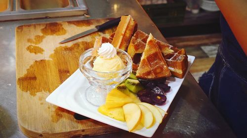 High angle view of ice cream served on table