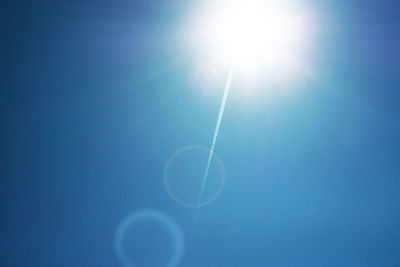 Low angle view of vapor trails in sky