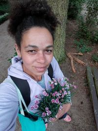 Portrait of smiling mid adult woman outdoors