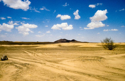 Scenic view of desert against sky