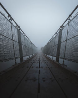 Suspension bridge in foggy weather