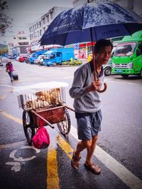 Woman walking on road