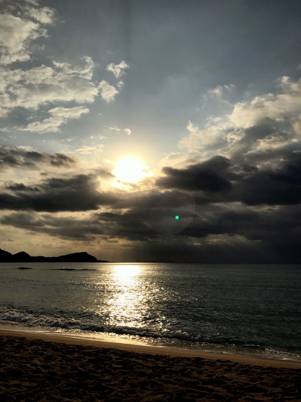 water, sunset, sky, beauty in nature, reflection, tranquility, scenics, nature, cloud - sky, tranquil scene, sea, outdoors, sun, no people, beach, day