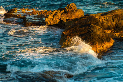 Scenic view of rocks in sea