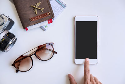 High angle view of smart phone on table