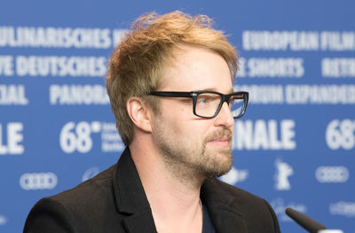 Close-up of young man wearing eyeglasses