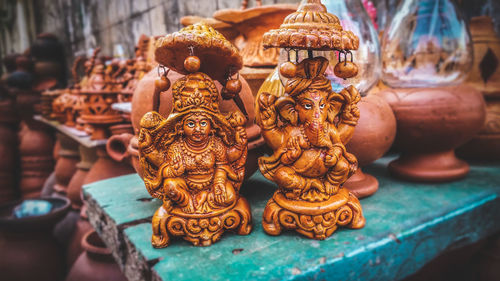 Close-up of buddha statue in market