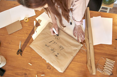 High angle view of woman with text