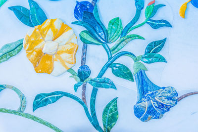 High angle view of various flowers on table