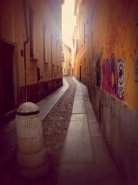 Narrow alley along buildings