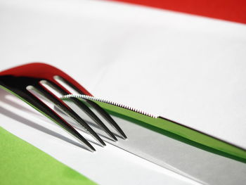 Close-up of fork and table knife on table