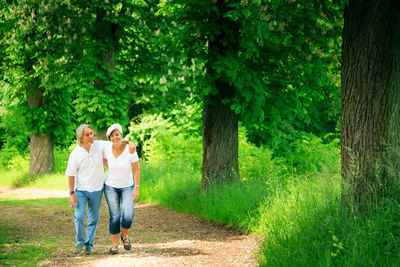Full length of woman walking in park