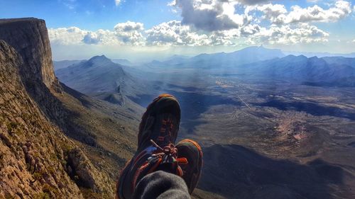 Low section of man against mountains