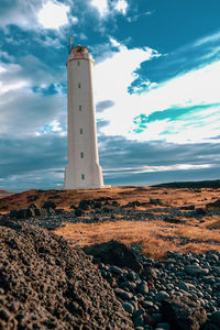 Low angle view of lighthouse against sky