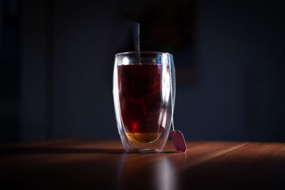 Close-up of beer glass on table