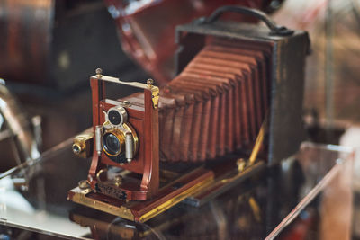 Close-up of vintage camera on table