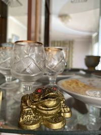 Close-up of glasses on table