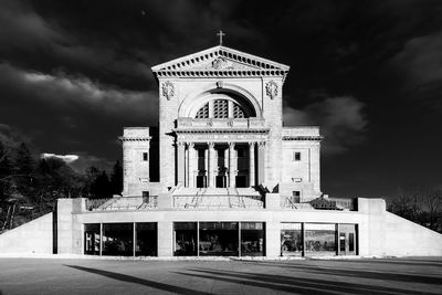 Facade of historic building against sky