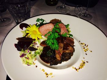 Close-up of food served on table