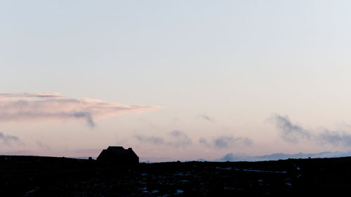 Scenic view of silhouette landscape against sky during sunset