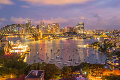 Illuminated buildings in city at night