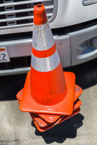 Close-up of red car on road