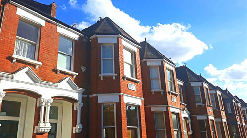 Low angle view of residential buildings against sky