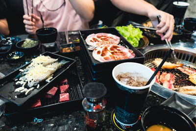 High angle view of people preparing food