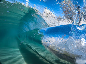 Close-up of water splashing in sea