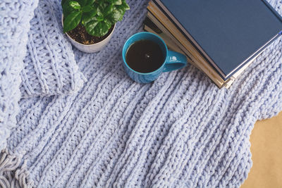 High angle view of coffee cup on table